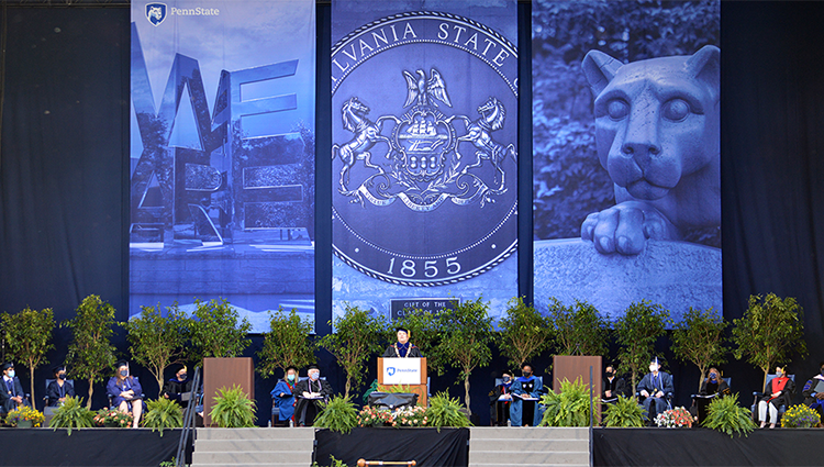 President Barron at the podium during graduation